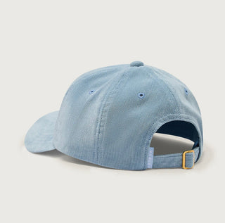 Light blue denim cap on a light gray background