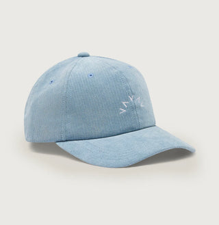 Light blue baseball cap with a logo on a light gray background