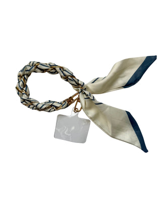 Necklace with a scarf wrap and a tag on a white background