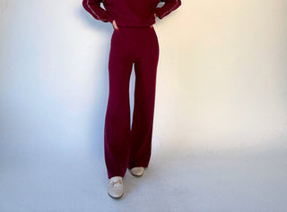 Person wearing a red outfit with a blurred background