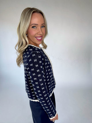 The Harlow Cardigan Side Smiling Image