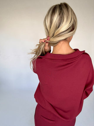 VARLEY Hawley Half Zip New Maroon Back Hair Up Close Up Image