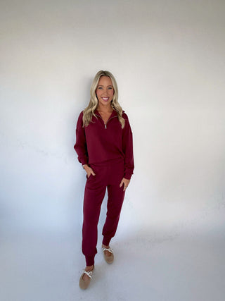 VARLEY The Slim Cuff Pant 27.5" New Maroon Full Length Hand in Pocket Image