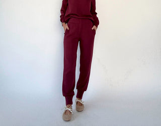 VARLEY The Slim Cuff Pant 27.5" New Maroon Full Length Hands in Pockets Image
